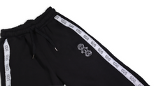 Load image into Gallery viewer, Repeat Logo Tape Black Fleece Joggers with 'Three Wise Monkeys' Embroidery